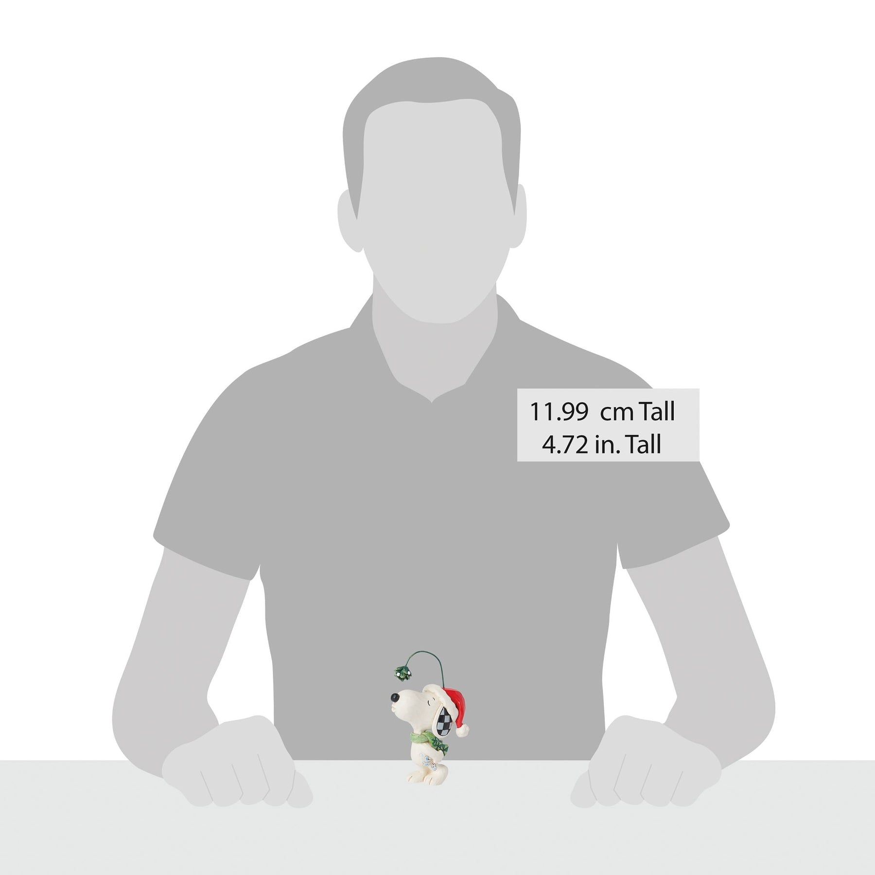 Snoopy with mistletoe figurine size comparison with adult male silhouette, 11.99cm / 4.72 inches tall 