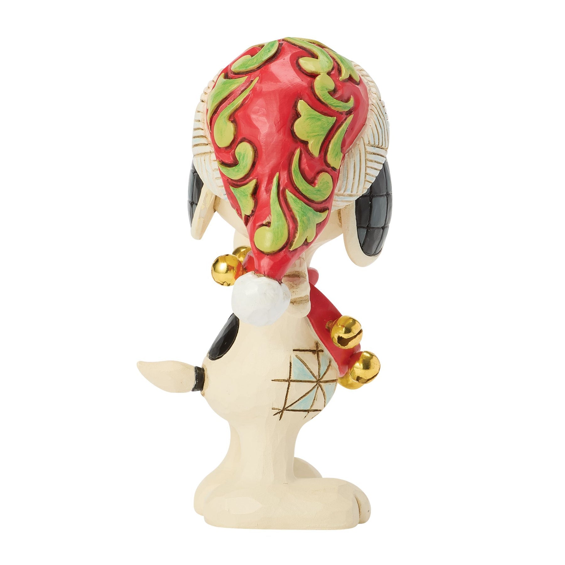 Left side view of Snoopy Christmas figurine, red and green folk art Santa hat, gold jingle bell wreath, tail visible