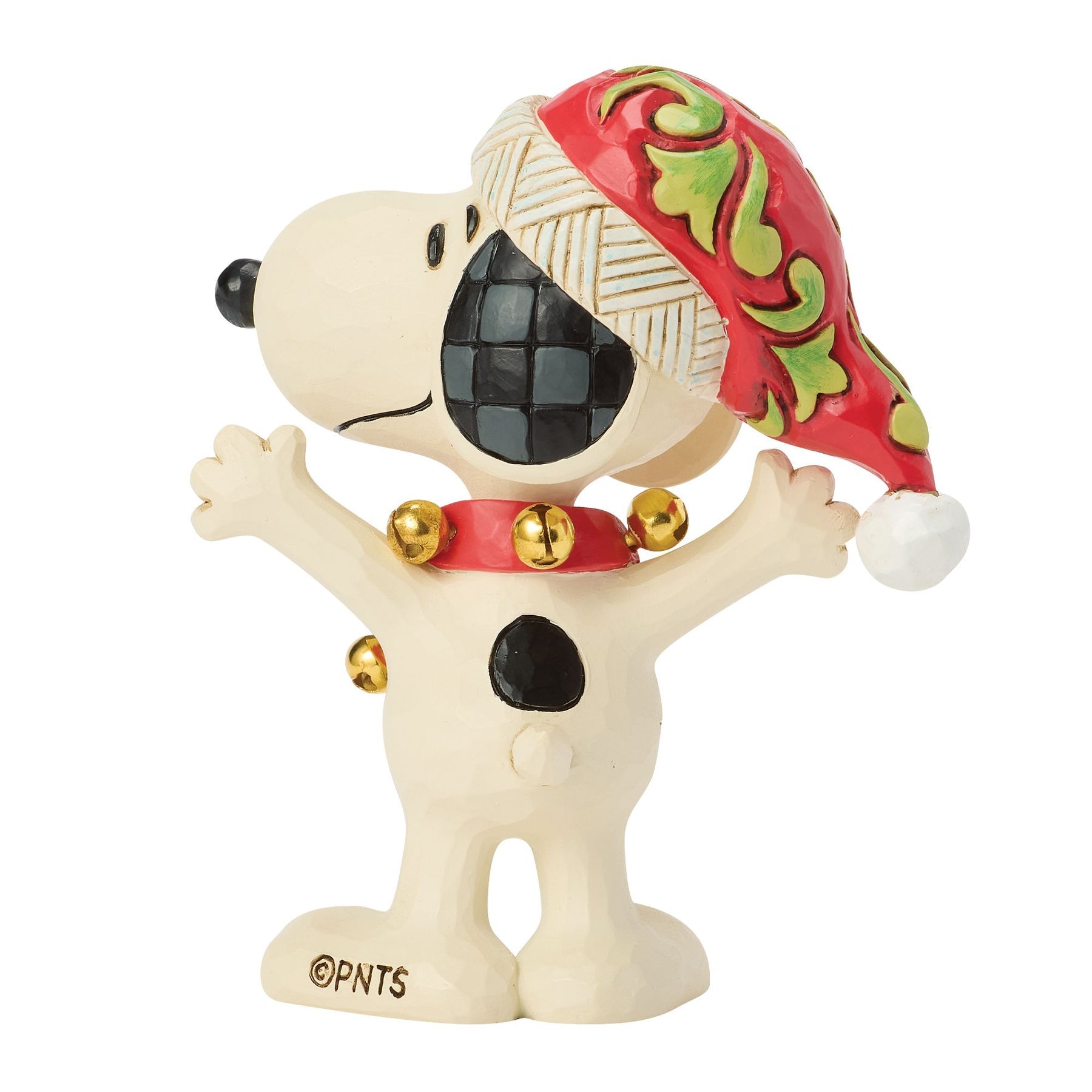 Rear view of Snoopy Christmas figurine showing red folk art Santa hat with green scrollwork detail and gold jingle bell collar