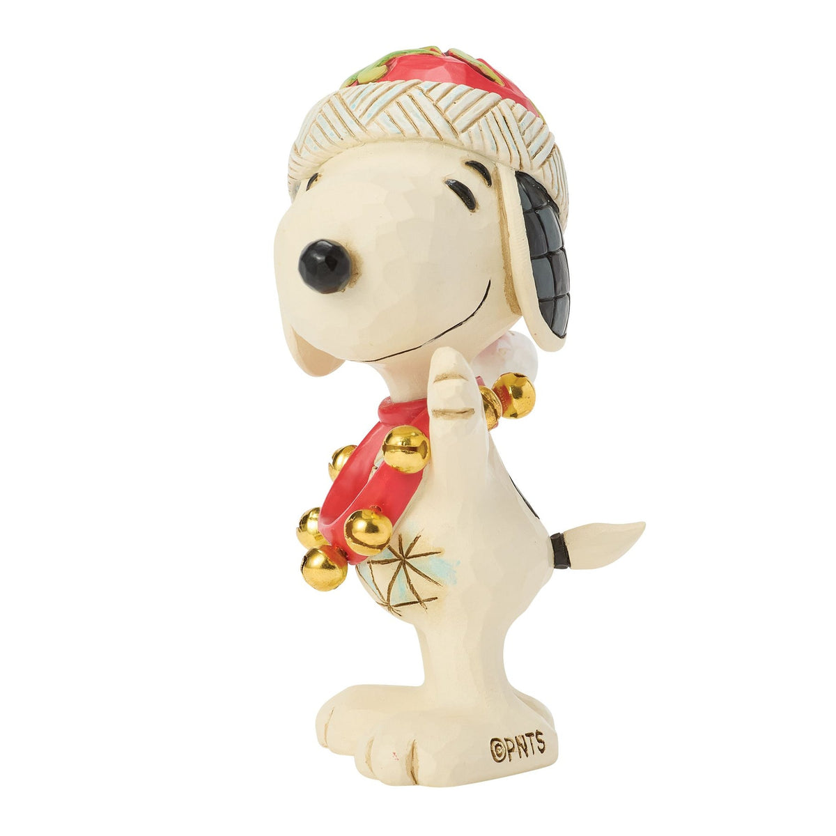 Right side angle of Snoopy Christmas figurine, red folk art Santa hat with white pompom, gold jingle bell collar, arms raised