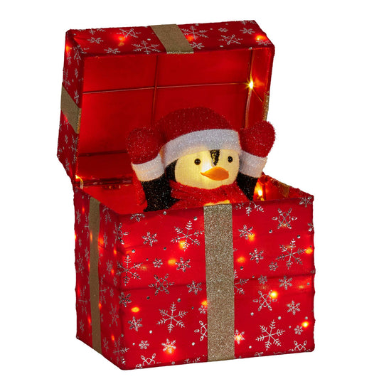 Red LED light-up gift box decoration with penguin in Santa hat popping out and snowflake detail, lit
