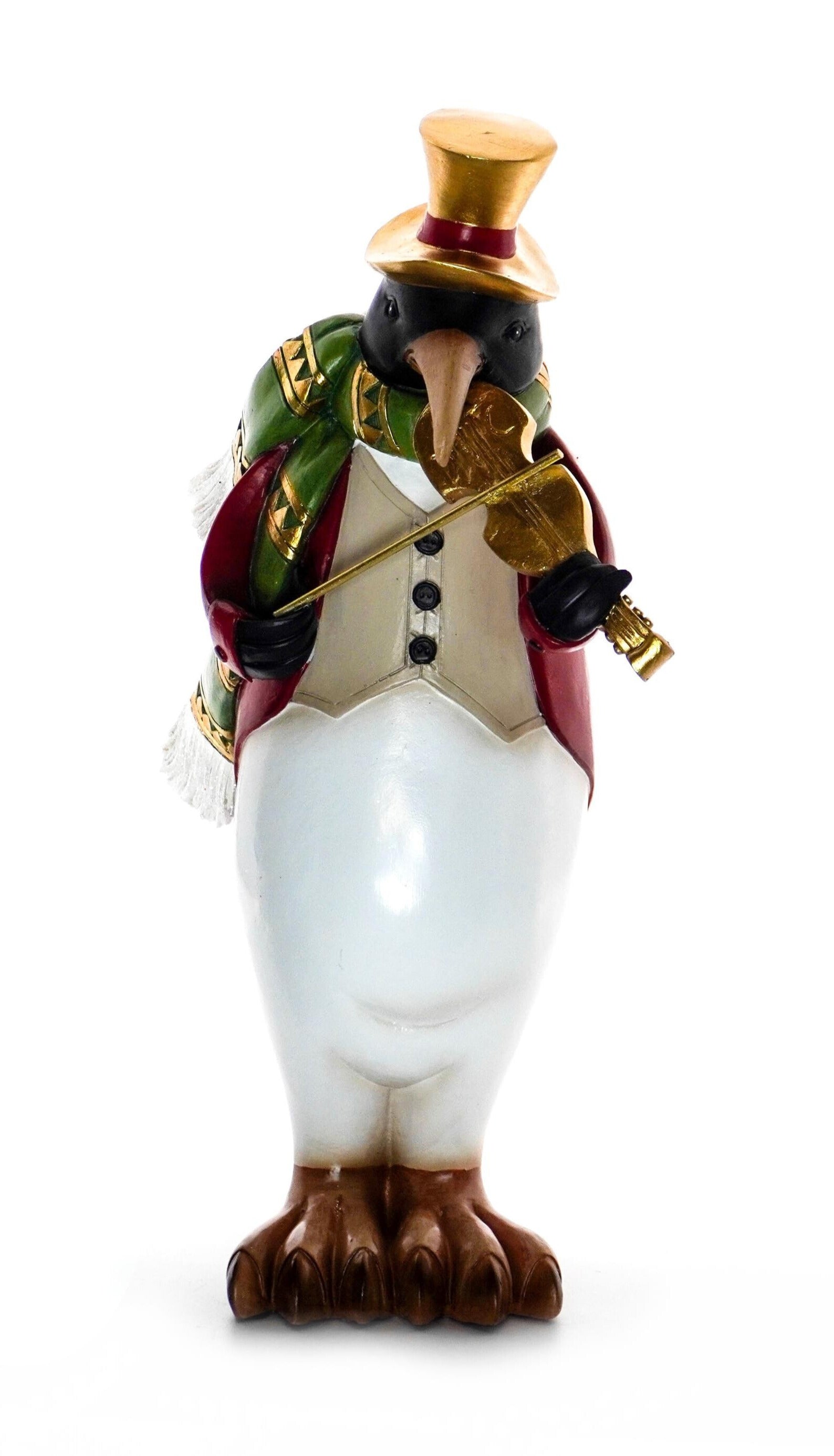 Penguin figurine wearing red and green jacket with gold top hat holding a violin