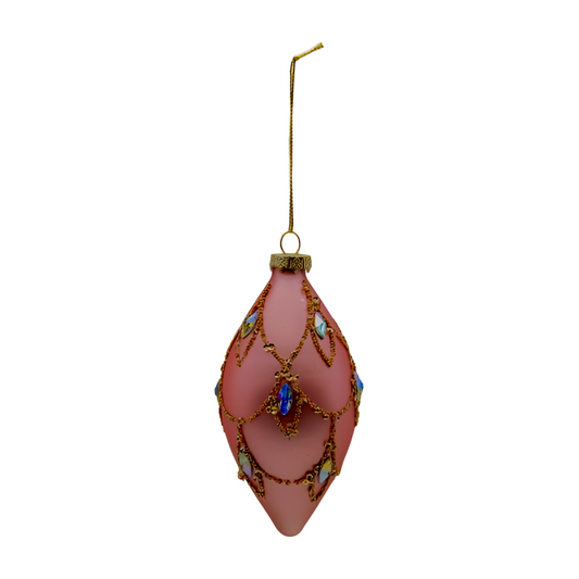 Pink matte glass drop-shaped Christmas bauble with gold swag detail, blue and iridescent faceted jewel embellishments and gold hanging cap.