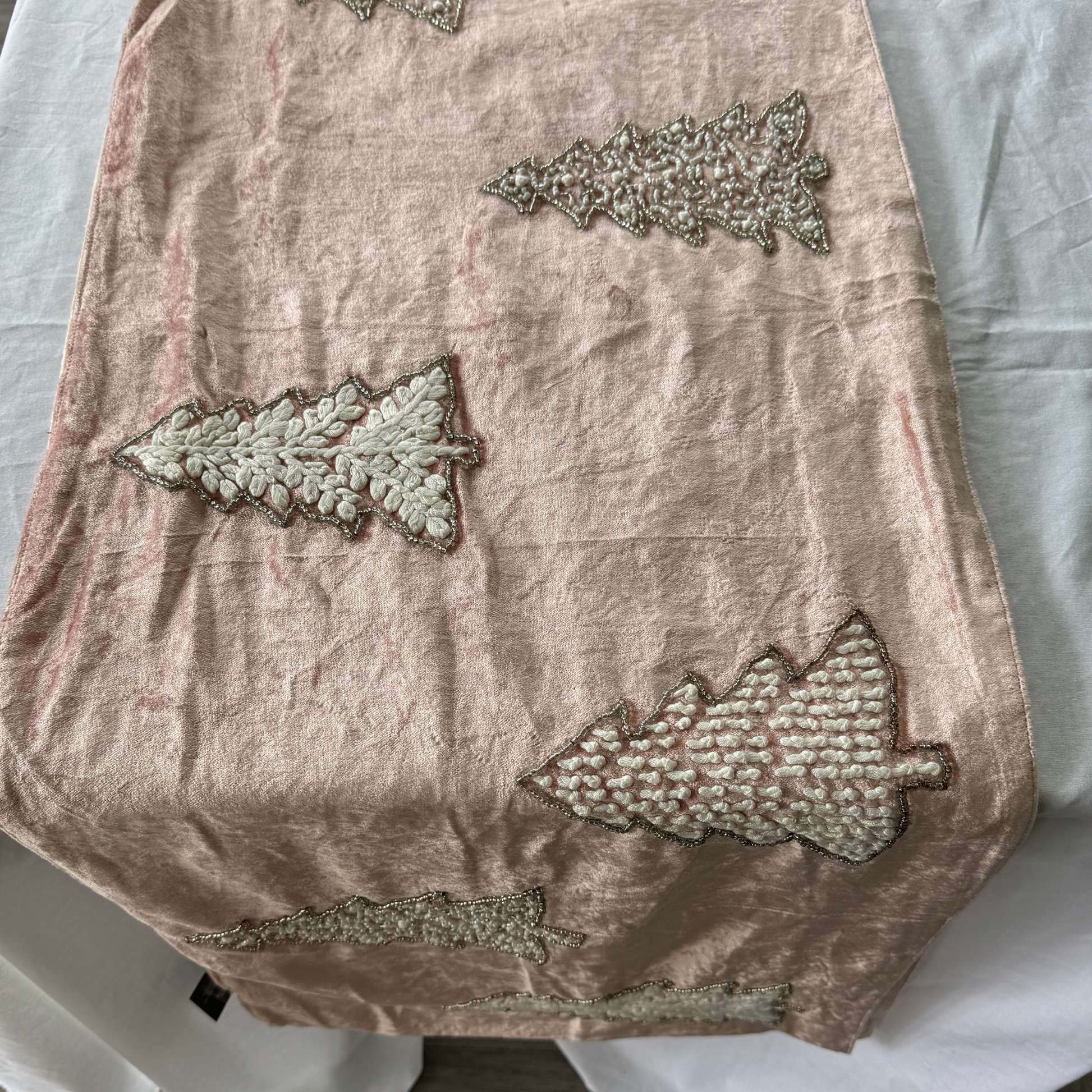 Hand-beaded pink velvet table runner with silver Christmas tree design