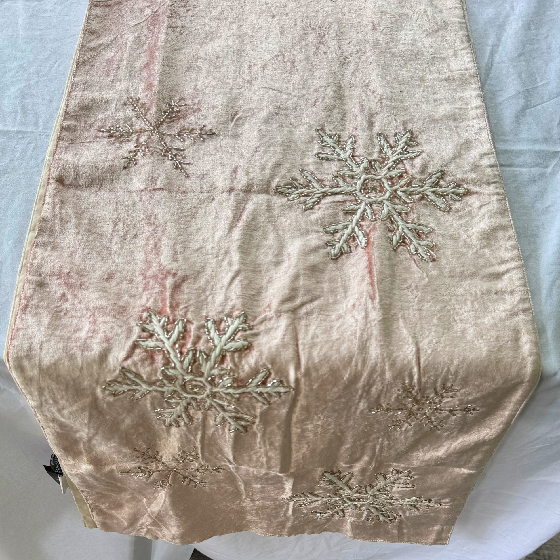 Hand-beaded pink velvet table runner with silver and champagne snowflake design