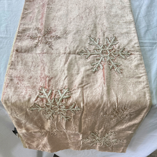 Hand-beaded pink velvet table runner with silver and champagne snowflake design