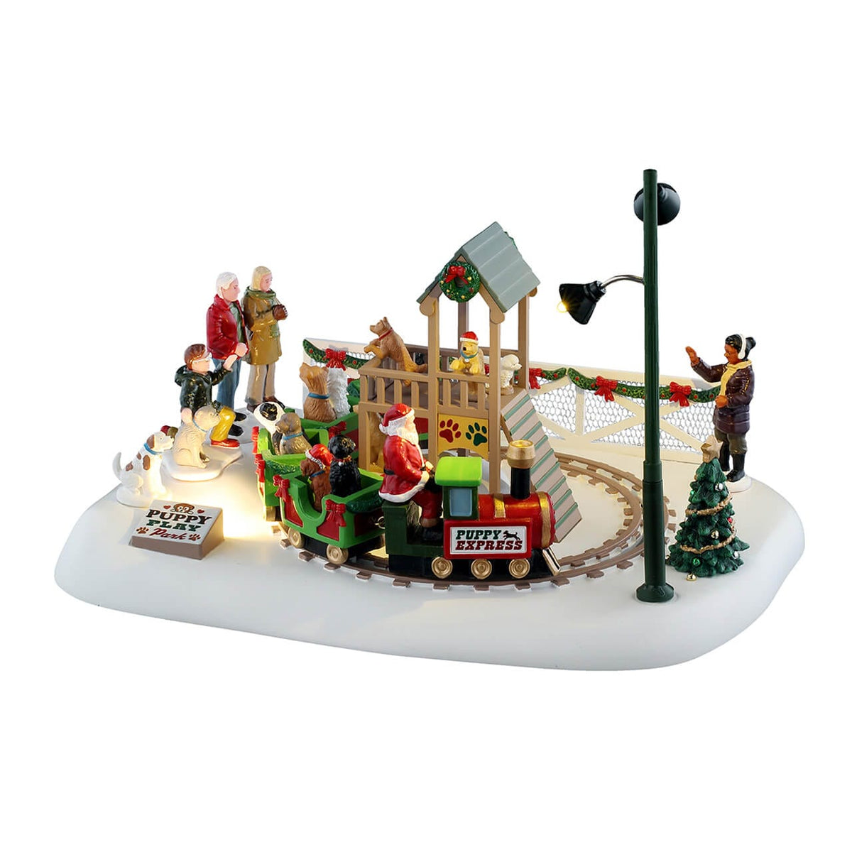 Lemax Puppy Play Park scene with Santa driving the Puppy Express train and playful dogs