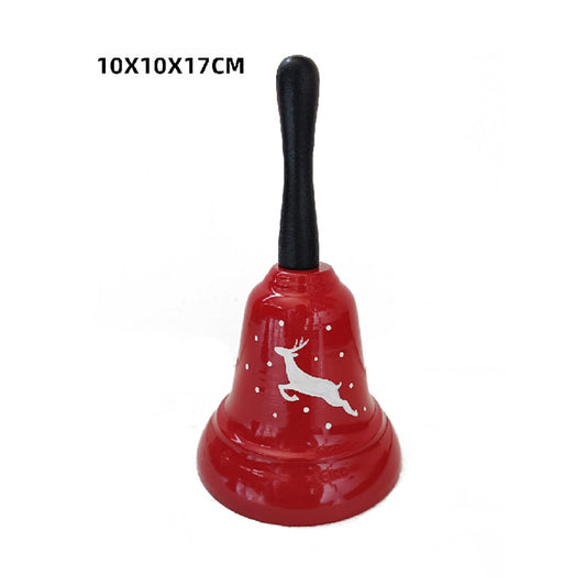 Red bell with a black handle and reindeer design on a white background