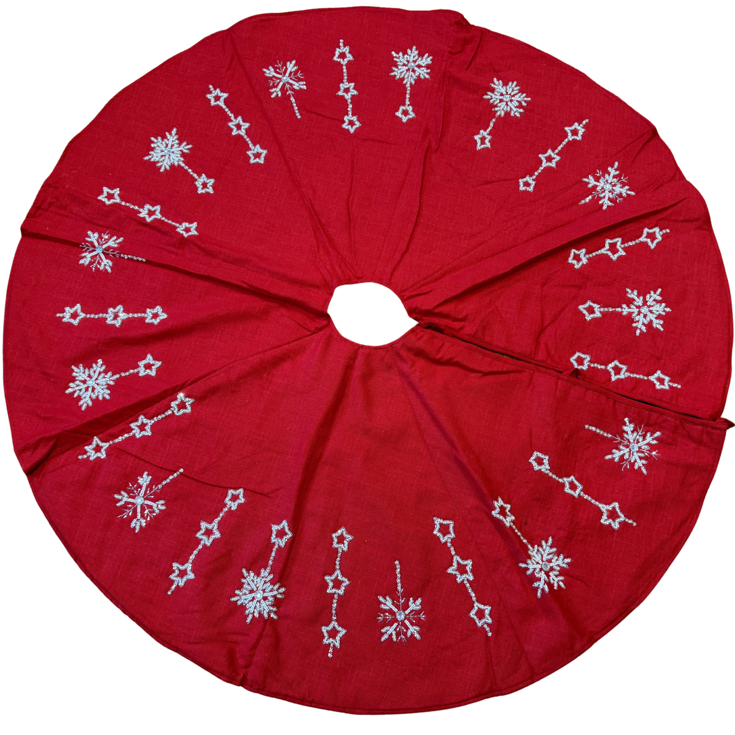 Hand-beaded red cotton Christmas tree skirt with white star and snowflake designs