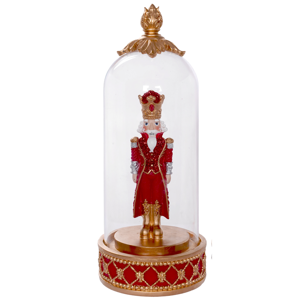 Red and gold nutcracker figurine in sequin coat and jewelled crown, housed in a glass dome on a decorative base