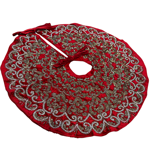 Red velvet Christmas tree skirt with gold and silver hand-beaded design