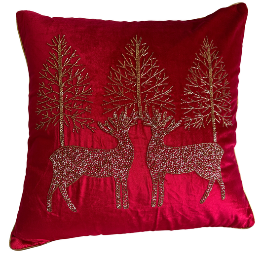 Hand-beaded red velvet Christmas cushion with white and gold reindeer 