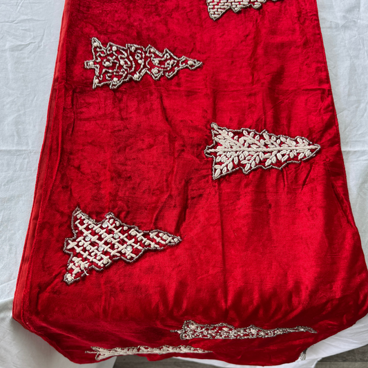 Hand-beaded red velvet table runner with silver Christmas tree design