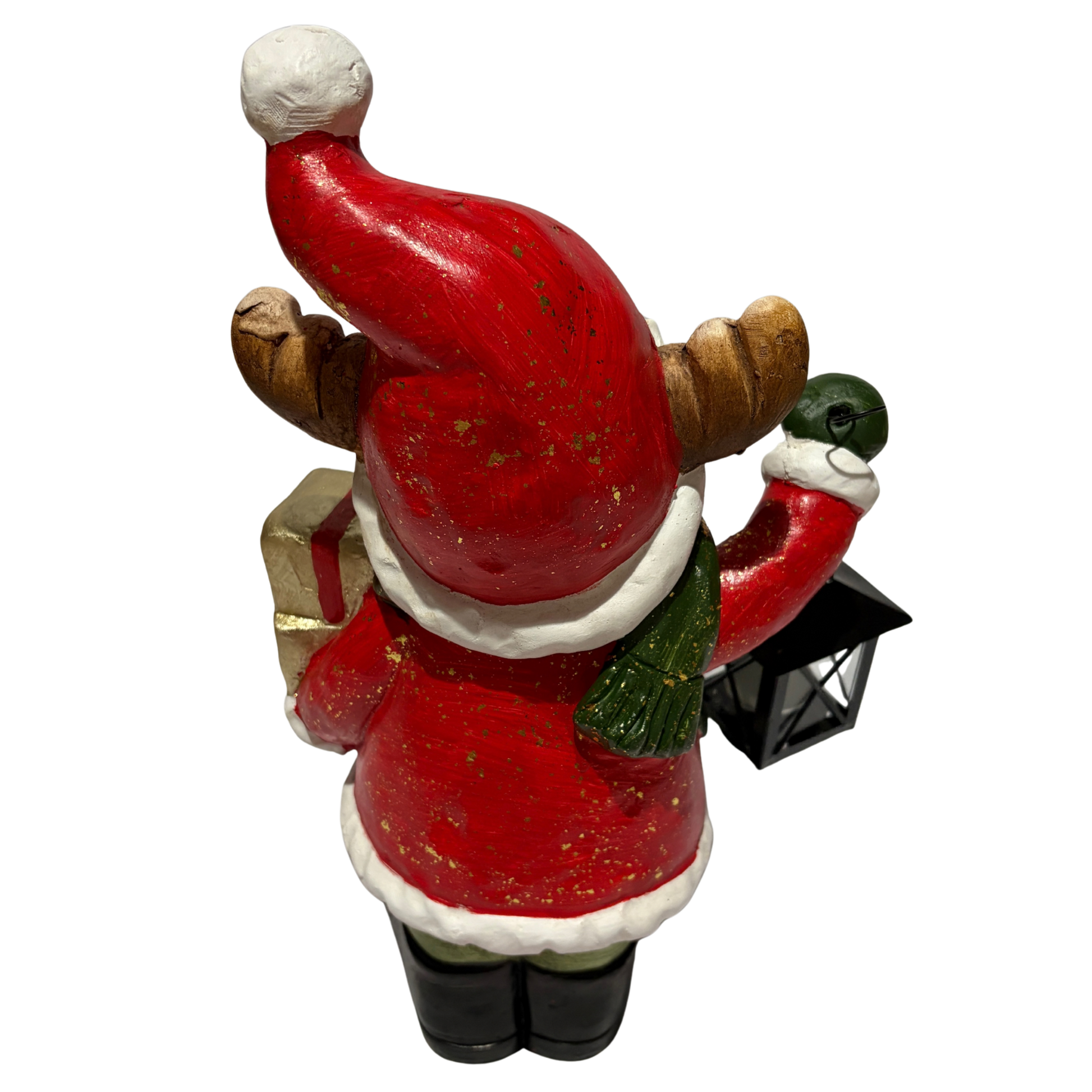 Smiling reindeer figurine wearing a red Santa outfit and green scarf, holding a lantern and a wrapped gift