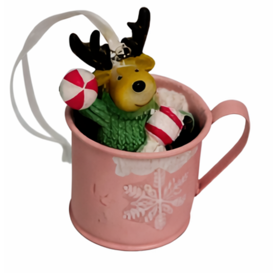 Pink mug Christmas tree ornament with a reindeer figurine and snowflake detail