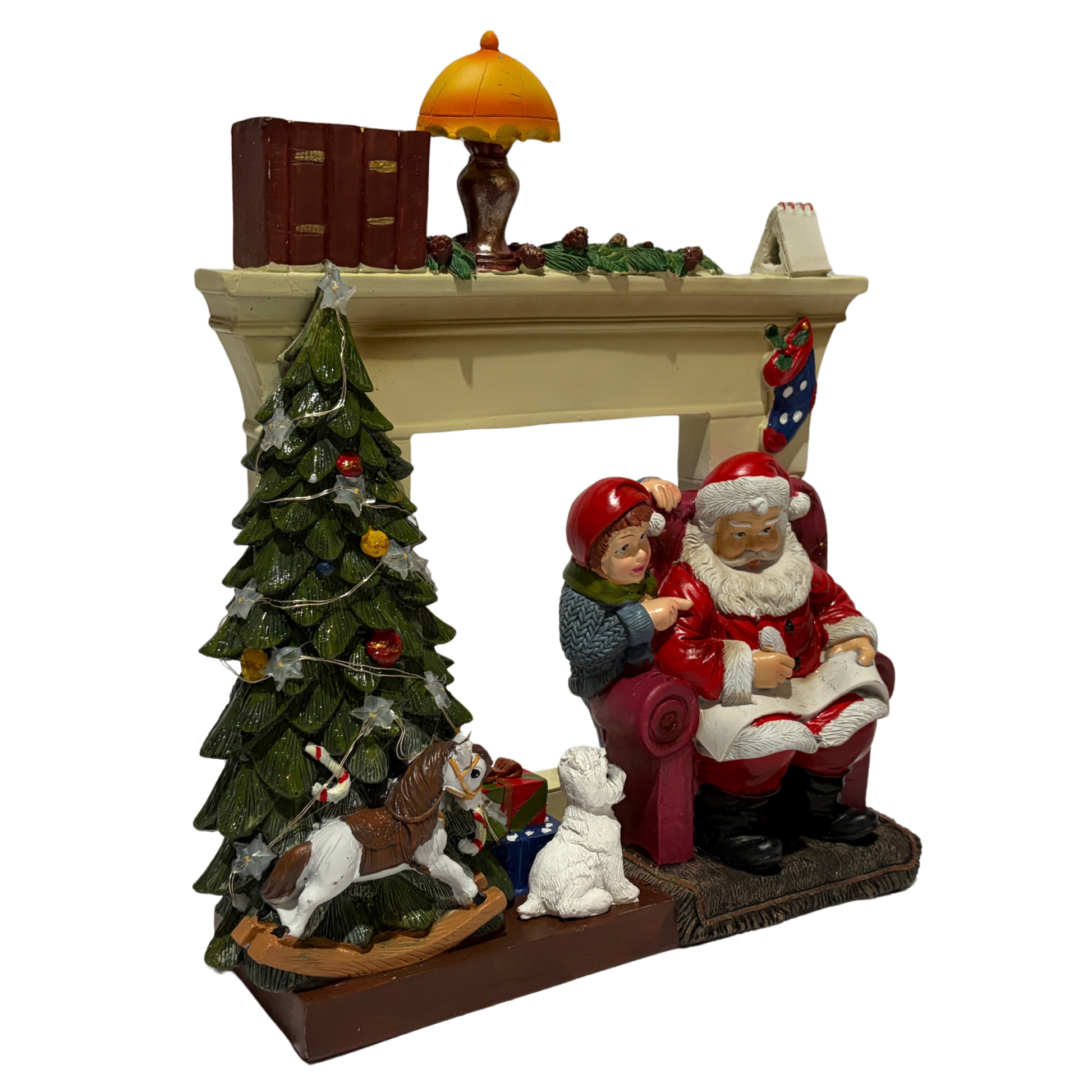  Santa sitting in an armchair beside a Christmas tree and fireplace with a child and dog nearby