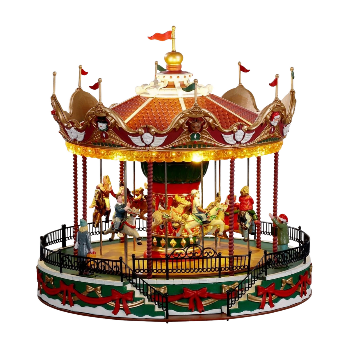 Illuminated Christmas carousel with horse riders, decorative red and gold canopy, red flags, and festive bow-trimmed base
