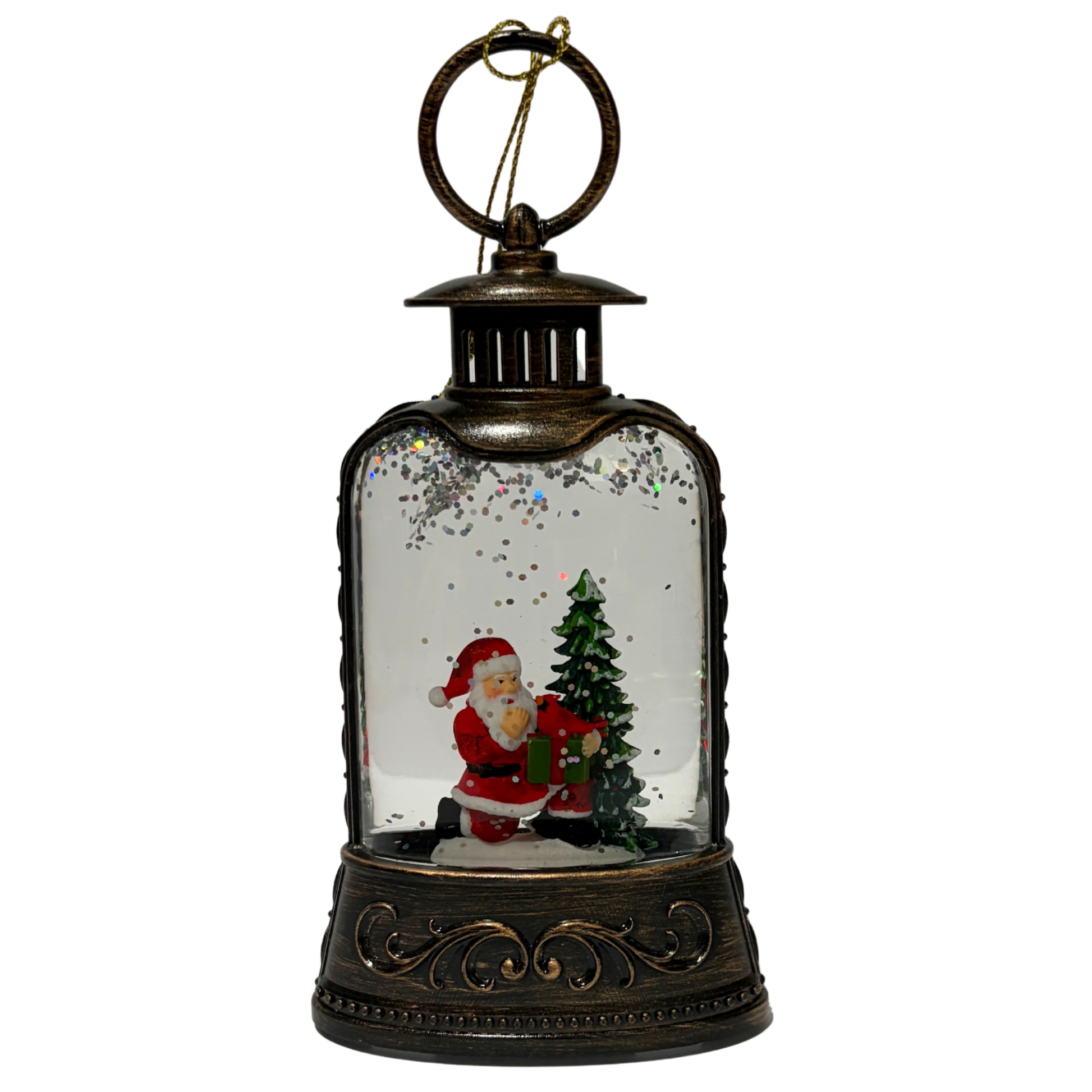 Mini lantern with Santa holding a present beside a Christmas tree and swirling glitter