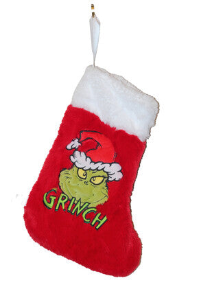 Red plush Christmas stocking with white cuff featuring the Grinch wearing a Santa hat and green “GRINCH” lettering