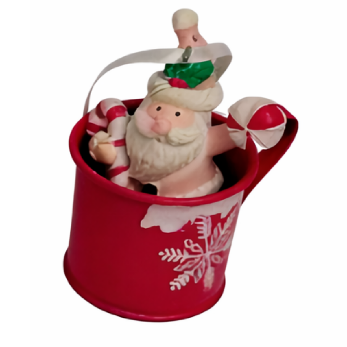 Hot pink mug Christmas tree ornament with a Santa figurine and snowflake detail