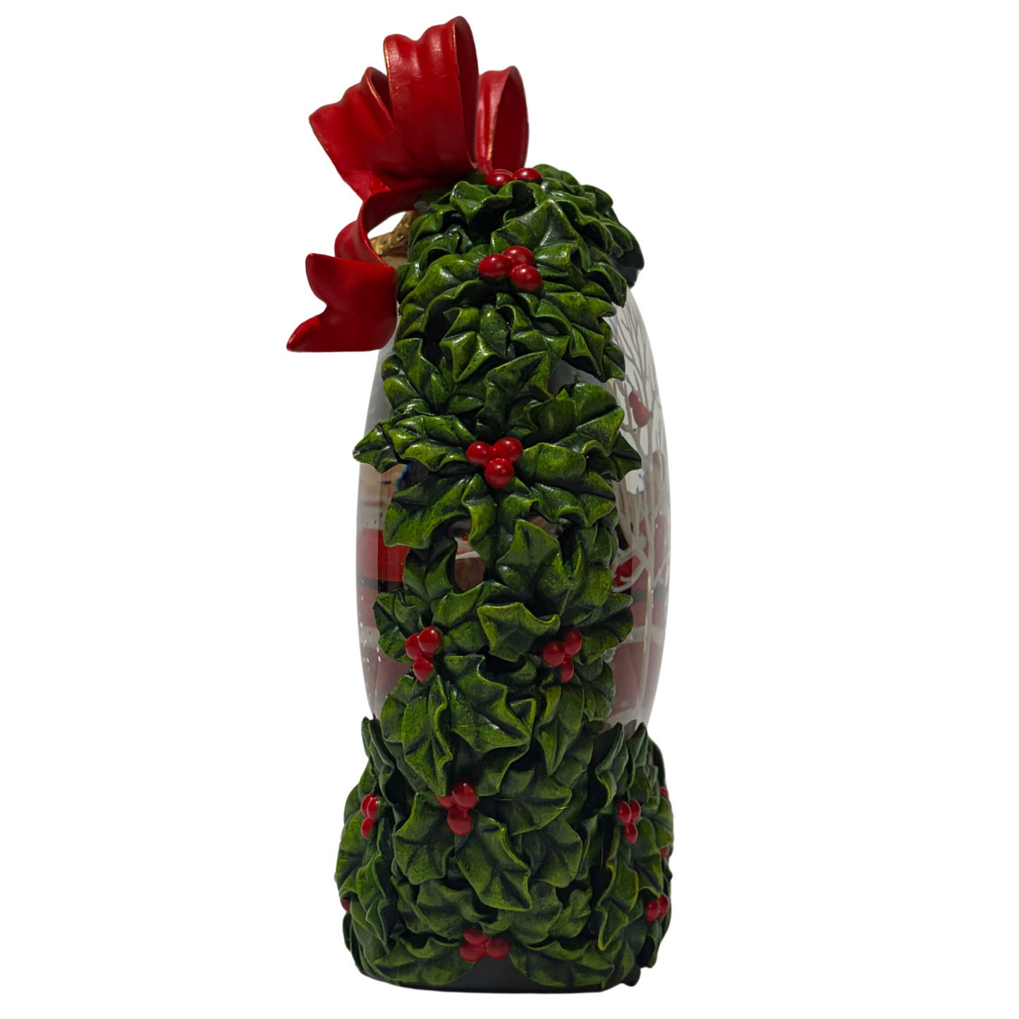 Santa in wreath snow globe decoration with holly leaves, red bow, and woodland scene snow globe.