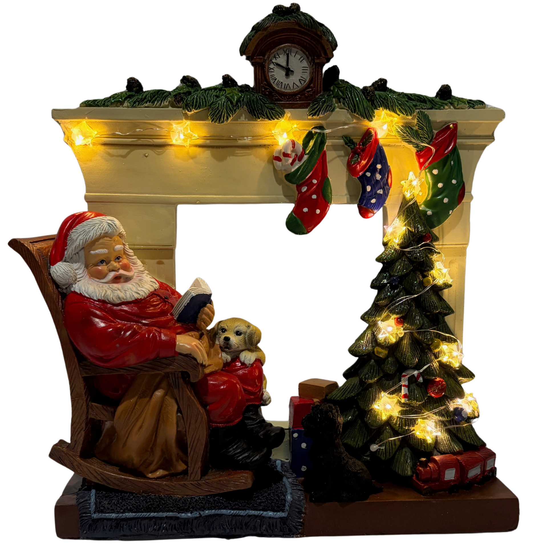 Santa sitting in a rocking chair beside a Christmas tree and fireplace with stockings and a puppy on his lap