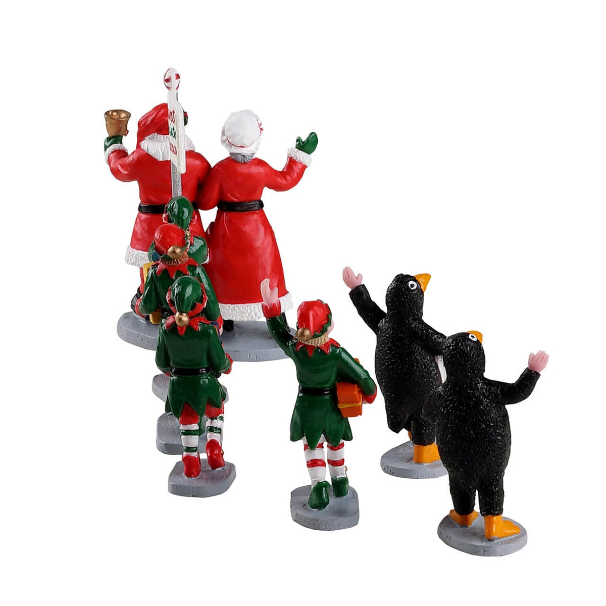 Rear view of Santa's Christmas Parade flag, elves carrying gifts and penguin costume figures