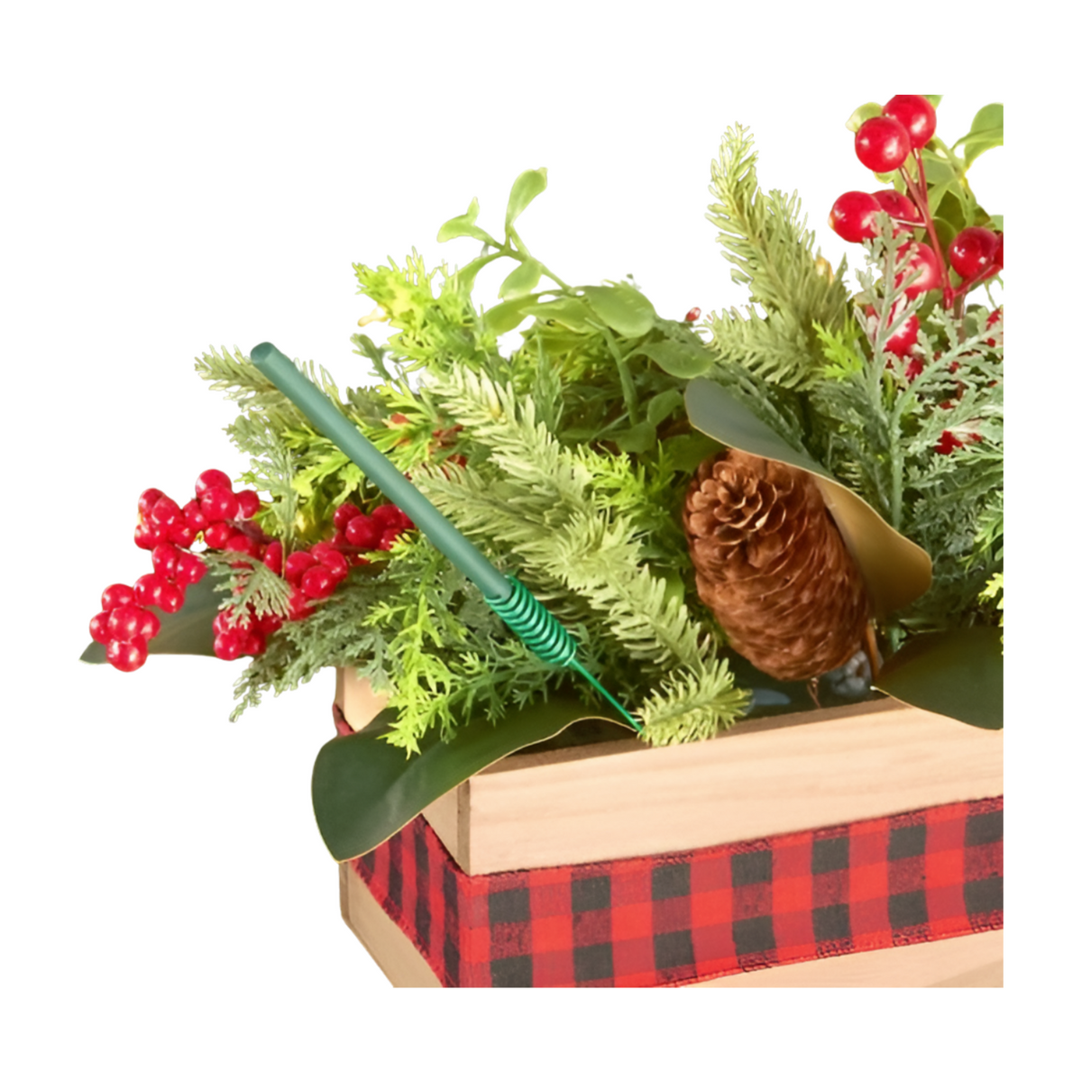Green Scentsicles Scenter Stake in a festive pine and berry centrepiece arrangement