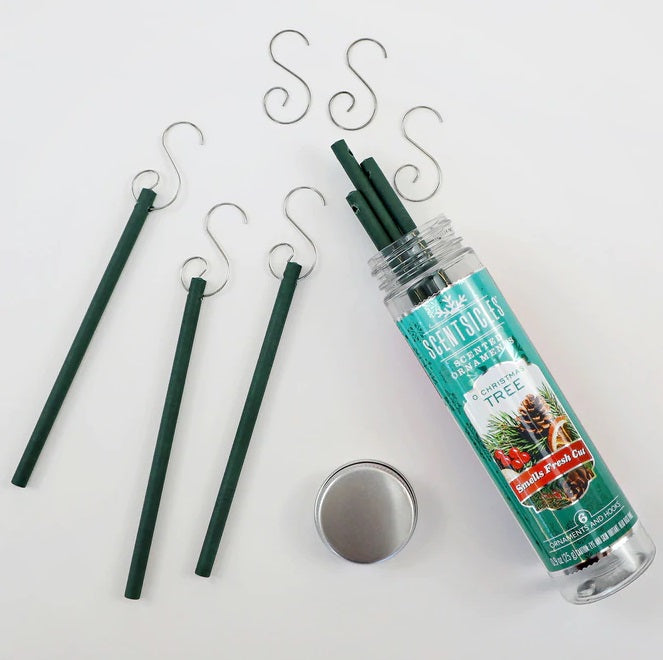 Decorative candle sticks with a container on a white background