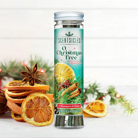 Scentsicles O Christmas Tree scented ornament packaging with dried oranges and cinnamon sticks on a white background.