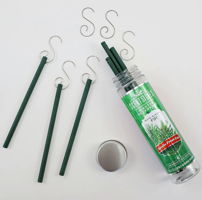 Scent Stick packaging with sticks and hooks on a white background