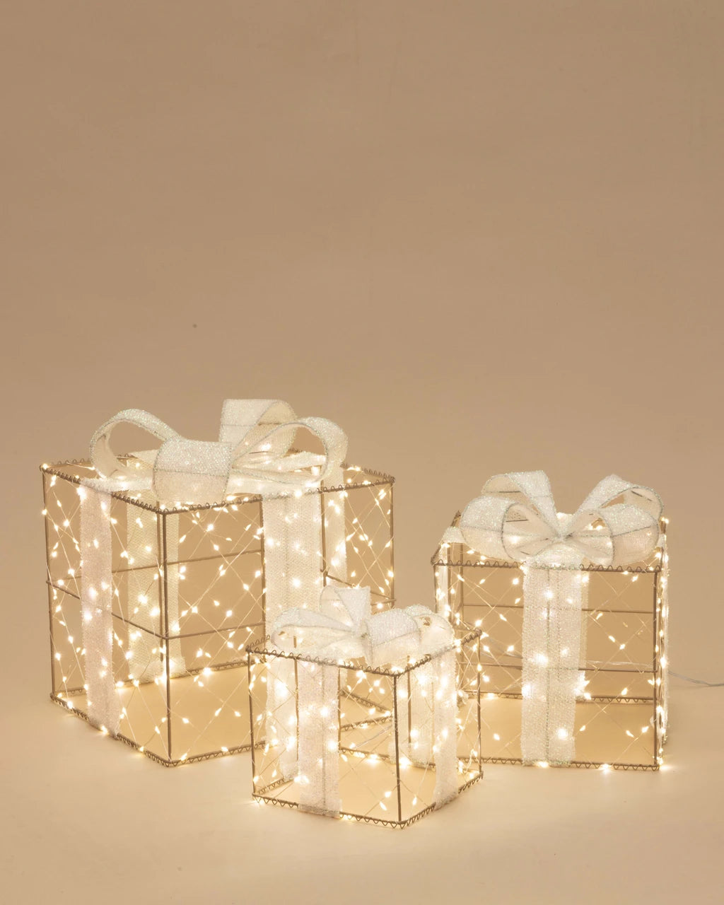 Set of three light-up gift box decorations with opal glitter ribbon bows and warm white lights