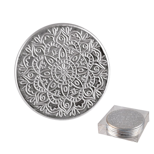 Set of six silver embossed filigree coasters with intricate botanical and geometric relief pattern, in gift box