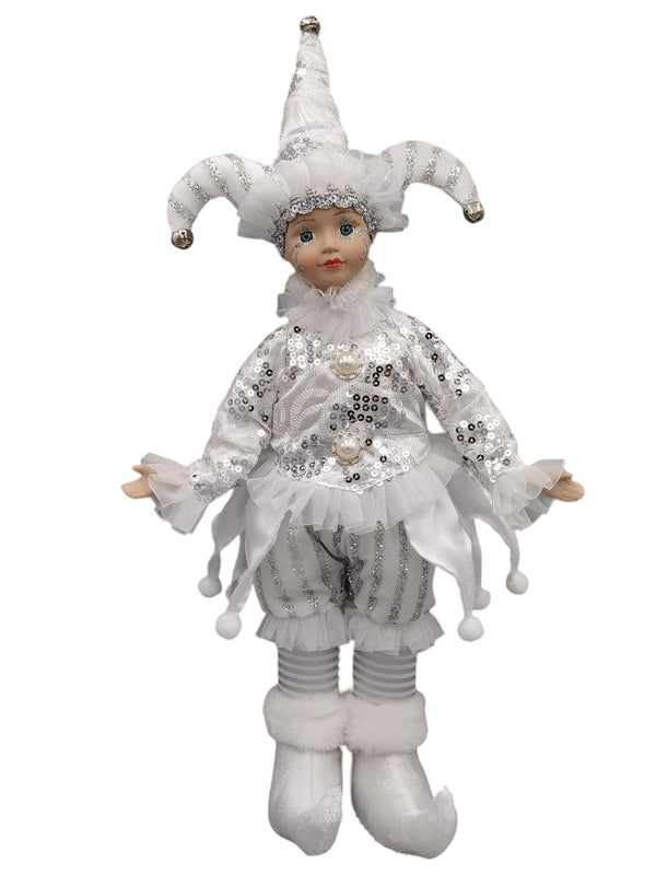 Musical jester doll dressed in silver and white with sequins, lace, and a jester hat