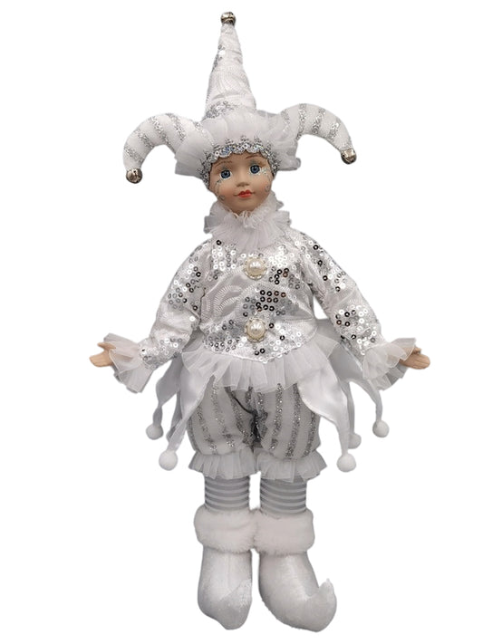 Musical jester doll dressed in silver and white with sequins, lace, and a jester hat