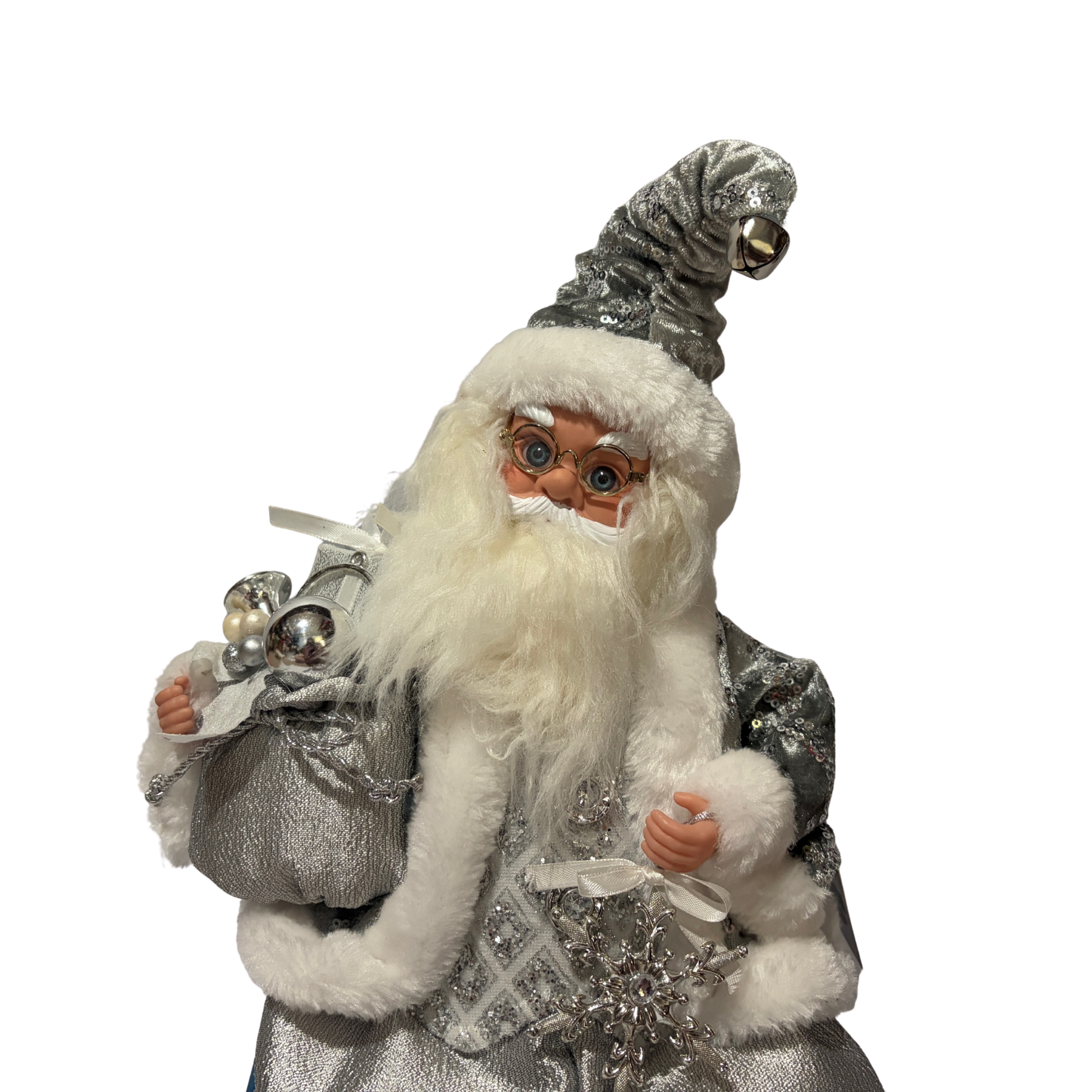Sitting Santa Claus wearing silver with sequin accents, holding a sack of presents in one hand and a snowflake decoration in the other