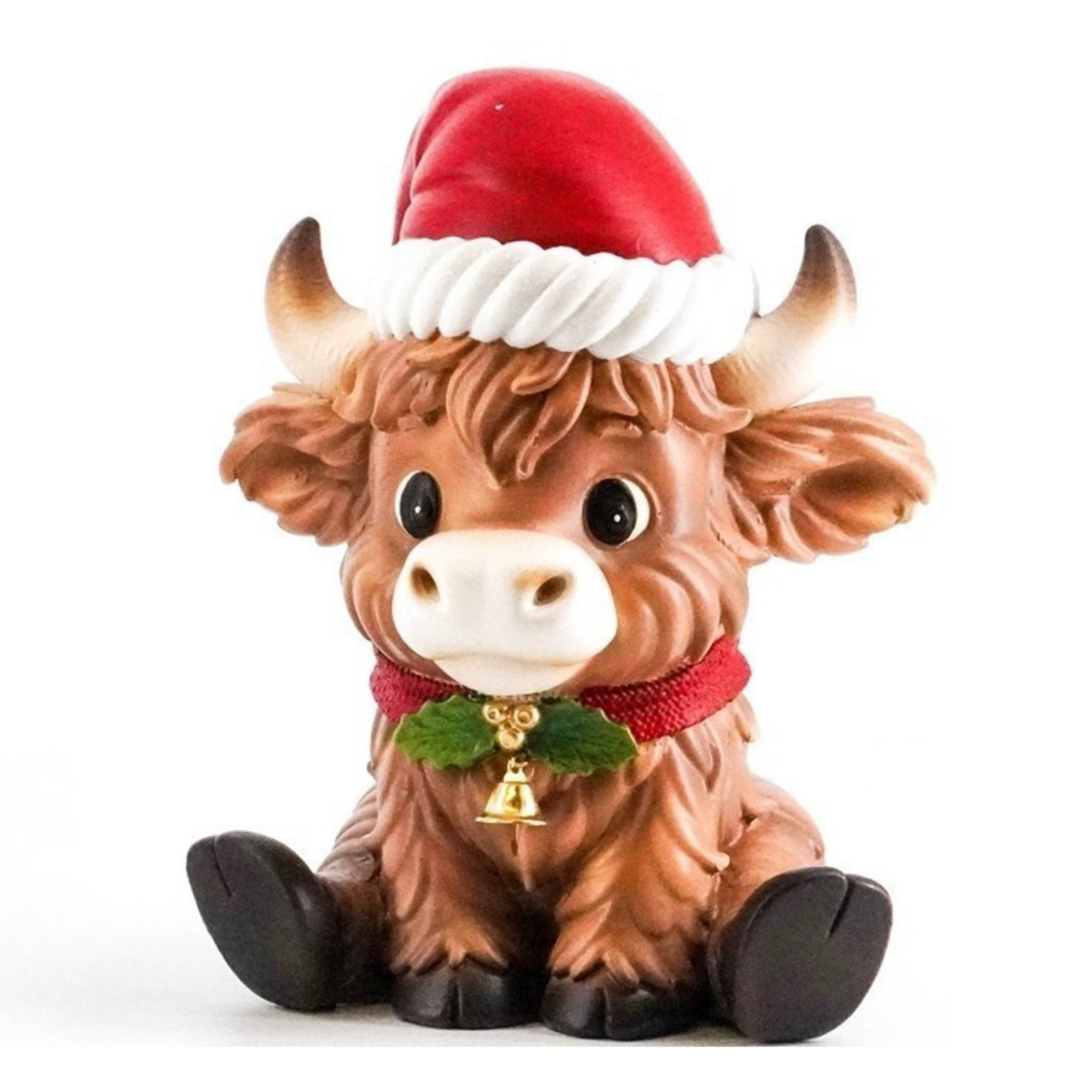 Sitting Highland cow figurine wearing a red Santa hat and holly jingle bell collar