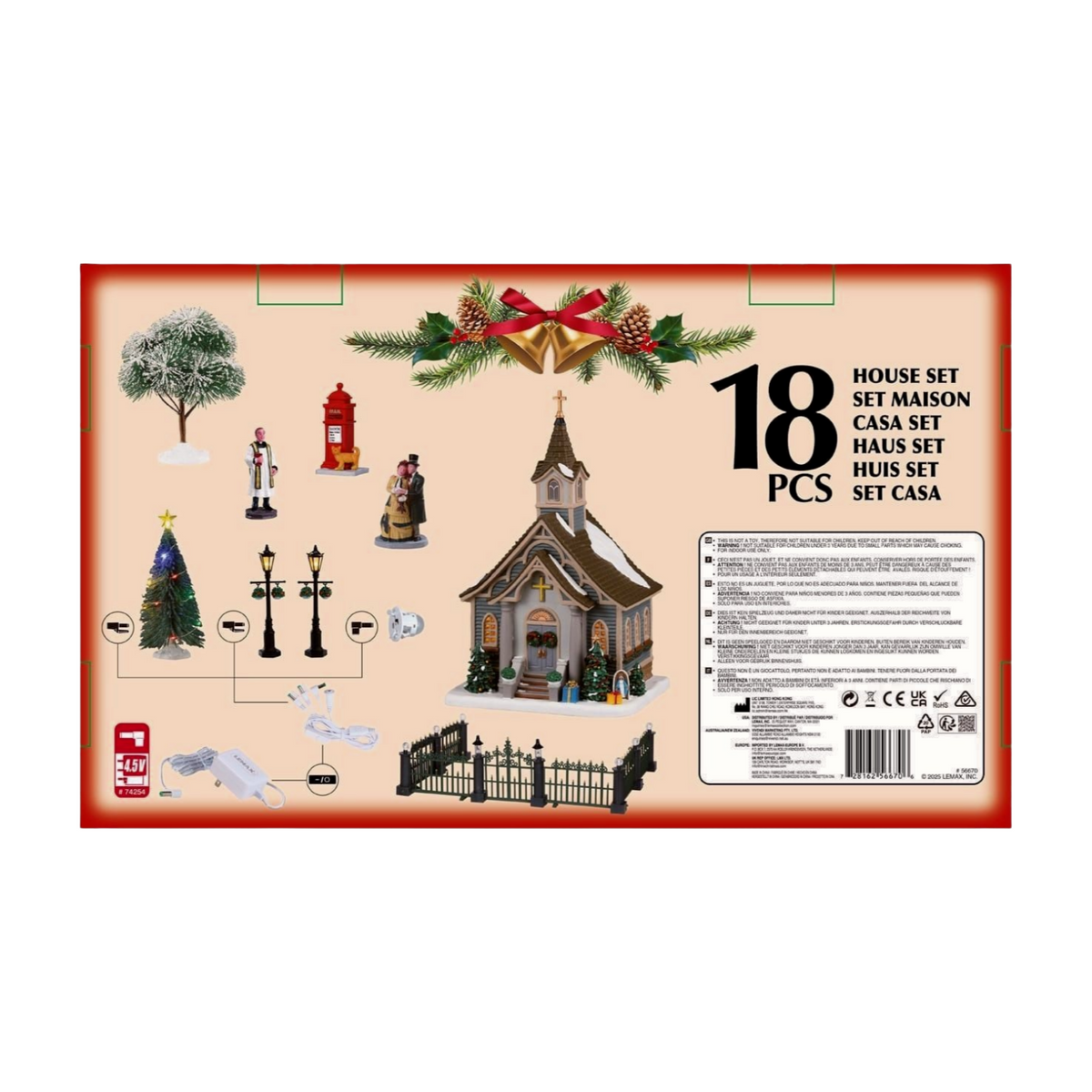 Rear of Lemax 18-piece Christmas village set packaging showing all included pieces: church, trees, lamp posts, figurines, fencing, and adaptor