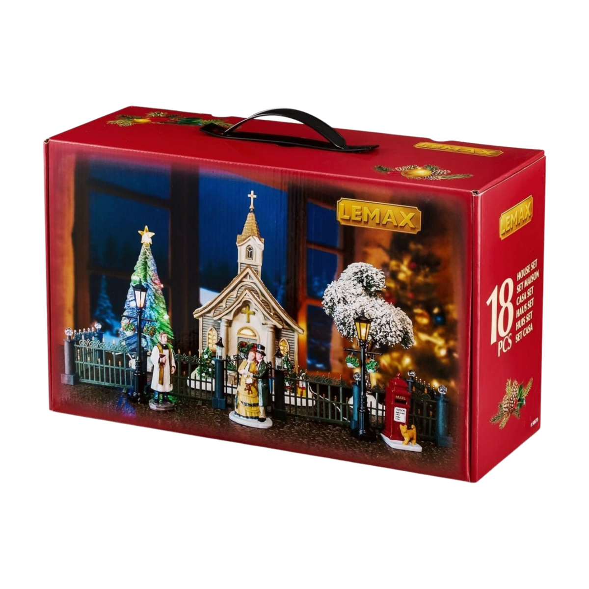 Lemax 18-piece Christmas village house set in red carry box showing lit church, figurines, lamp posts, trees, and iron fencing on the front