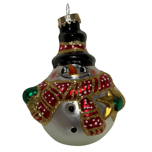 Decorative snowman ornament with a red scarf on a white background