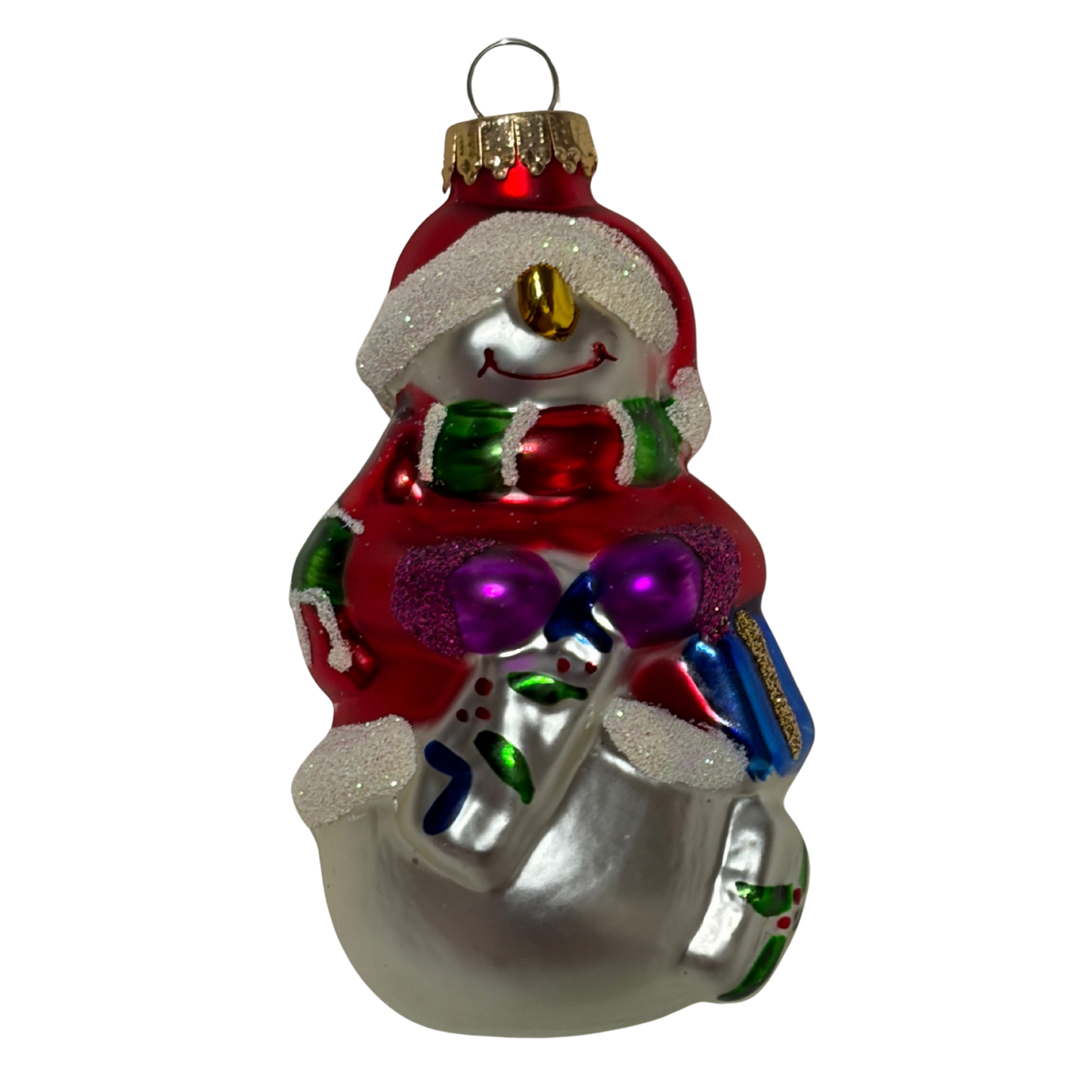 Snowman Christmas tree decoration wearing a red Santa hat and mittens, holding colourful presents