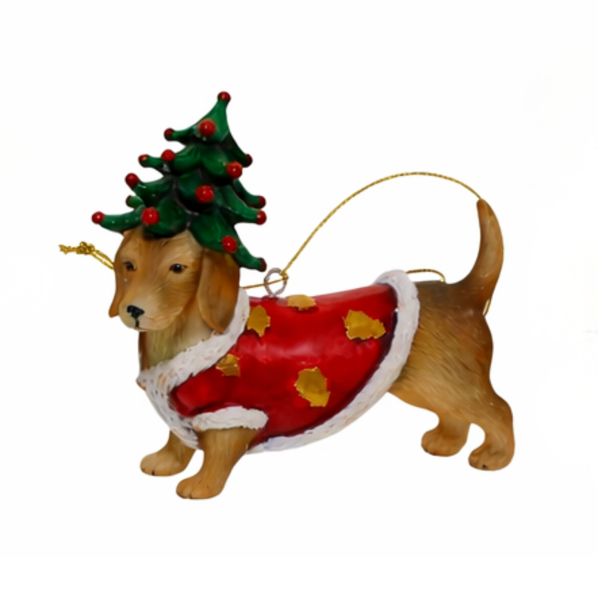 Tan dachshund Christmas tree decoration wearing a miniature tree hat and red fur-trimmed cape with gold bell detail