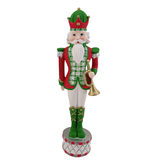 Red and green tartan nutcracker soldier holding a gold trumpet on a drum base hanging Christmas ornament