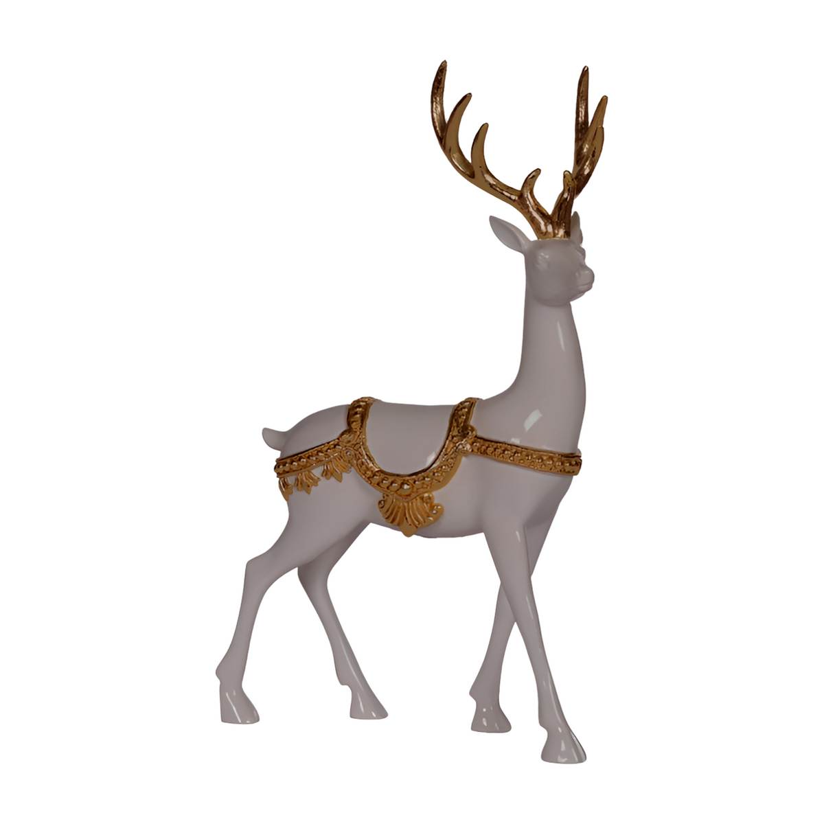 White reindeer decoration with gold antlers and ornate gold harness