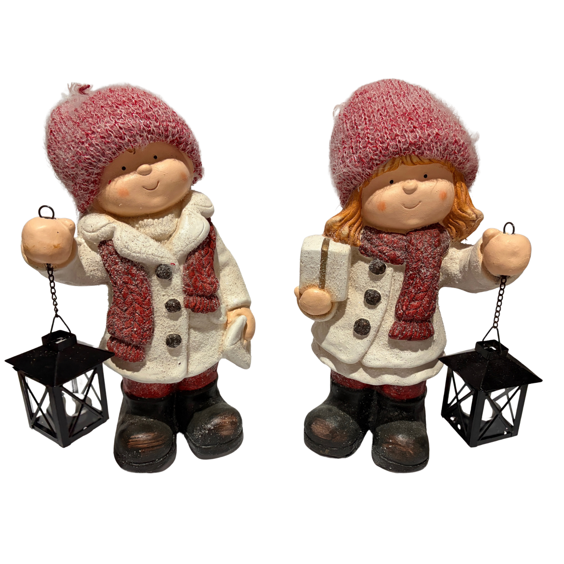 Two decorative figures of children in winter clothing with lanterns on a white background