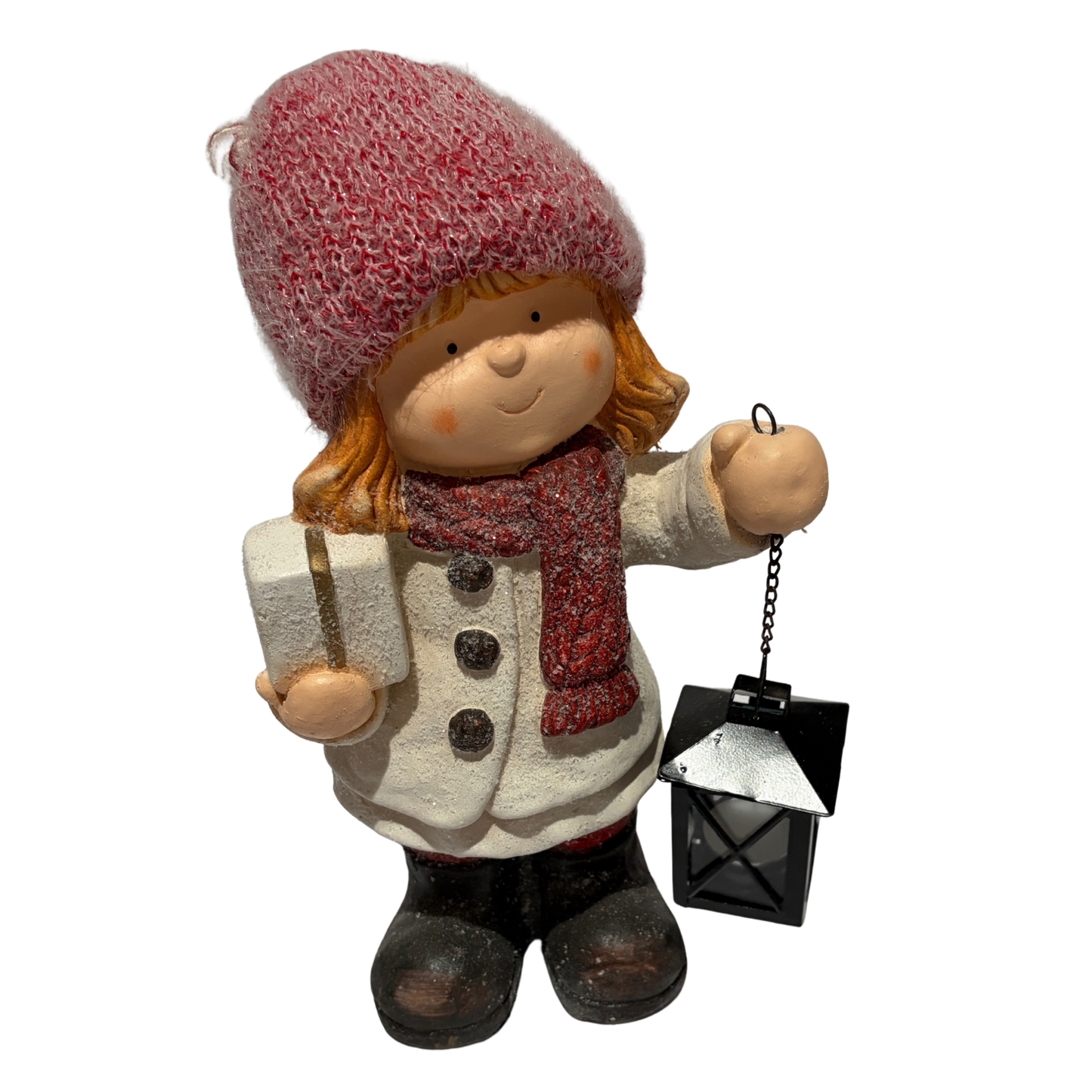 Winter girl figurine in a white coat and red hat holding a black lantern